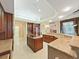 Elegant kitchen with granite countertops, custom cabinetry and modern appliances at 9460 Bearfoot Trl, Weeki Wachee, FL 34613
