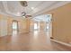 Open living area with hardwood flooring, elegant columns, and recessed lighting at 9460 Bearfoot Trl, Weeki Wachee, FL 34613