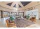 Elegant clubhouse lounge with soaring ceilings, stylish furnishings, and ample natural light at 9740 Lake Chase Island Way # 9740, Tampa, FL 33626