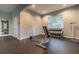 Functional fitness area showcasing free weights, benches, and ample workout space at 9740 Lake Chase Island Way # 9740, Tampa, FL 33626