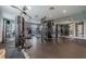 Well-equipped fitness center featuring modern weight machines and cardio equipment for residents' convenience at 9740 Lake Chase Island Way # 9740, Tampa, FL 33626