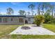Backyard featuring a patio area and fire pit at 116 Solana St, North Port, FL 34287