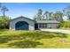 Charming single-story home featuring a spacious lawn and driveway, offering curb appeal at 116 Solana St, North Port, FL 34287