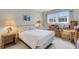 Bright and spacious bedroom filled with natural light and featuring ample storage space at 117 Fernwood Cir # 117, Seminole, FL 33777