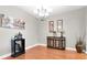 Elegant dining room with a chandelier, hardwood floors, and stylish decor, perfect for entertaining guests at 12304 Freesia Ct, Riverview, FL 33569