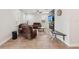 Spacious living room with neutral tones, fireplace, and ample natural light at 12402 Fairlawn Dr, Riverview, FL 33579