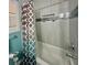 This bathroom features an enclosed shower and tub, offering a clean and modern design at 1345 S Evergreen Ave, Clearwater, FL 33756