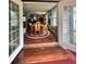 Open dining room featuring hardwood floors and views of the living space at 1345 S Evergreen Ave, Clearwater, FL 33756