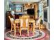 Stylish dining room with hardwood floors and a cozy fireplace at 1345 S Evergreen Ave, Clearwater, FL 33756
