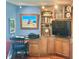 Bright living room features custom built-ins, desk area, and plenty of natural light at 1345 S Evergreen Ave, Clearwater, FL 33756
