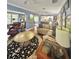 Warm living room featuring hardwood floors, an open layout and natural light at 1345 S Evergreen Ave, Clearwater, FL 33756