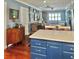 Spacious living area offers a view of blue cabinets and a warm, inviting atmosphere at 1345 S Evergreen Ave, Clearwater, FL 33756