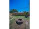 The beautiful backyard features a fire pit and a wooden privacy fence for outdoor enjoyment at 13970 Montego Dr, Seminole, FL 33776