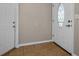 Entryway with tiled floors and a view of the front door at 13970 Montego Dr, Seminole, FL 33776