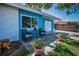 Cozy single-story home with an inviting seating area and charming curb appeal at 13970 Montego Dr, Seminole, FL 33776