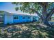 Charming single-story home featuring a well-maintained lawn and landscaped beds at 13970 Montego Dr, Seminole, FL 33776