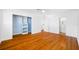 Spacious bedroom with hardwood floors and closet space, providing an inviting and organized atmosphere at 1431 Kings Hwy, Clearwater, FL 33755