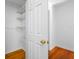 Well-organized walk-in closet featuring custom shelving and storage options to maximize space and organization at 1431 Kings Hwy, Clearwater, FL 33755