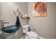 Stylish powder room featuring a unique glass bowl sink and modern fixtures at 1451 Gulf Blvd # 207, Clearwater Beach, FL 33767