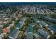 Expansive aerial view featuring a residential neighborhood with condo communities and tree-lined streets at 14692 Seminole Trl, Seminole, FL 33776