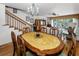 Dining room with view to the living room and outdoor seating area at 14692 Seminole Trl, Seminole, FL 33776