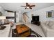 This living room has tile floors, neutral walls, and a staircase at 14692 Seminole Trl, Seminole, FL 33776