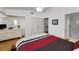 This main bedroom features a closet, ensuite, and neutral walls at 14692 Seminole Trl, Seminole, FL 33776