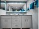 Dual-sink bathroom vanity with modern fixtures, and plenty of storage at 14723 Seminole Trl, Seminole, FL 33776