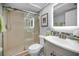 Clean bathroom with glass shower, and stylish vanity with custom mosaic backsplash at 14723 Seminole Trl, Seminole, FL 33776