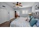 Bright bedroom offers ample closet space and sunlit windows with shutter details at 14723 Seminole Trl, Seminole, FL 33776