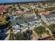 Desirable townhome features multiple levels of living space, large windows, a green roof, and a private driveway at 14723 Seminole Trl, Seminole, FL 33776