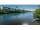 Scenic water view from a townhouse complex, featuring lush greenery and serene waterways at 14723 Seminole Trl, Seminole, FL 33776