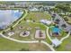 Aerial view of the community playground with various play structures and walking paths at 18860 Beautyberry Ct, Lutz, FL 33558