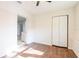 Bright bedroom with wood flooring and a closet at 18914 5Th St, Lutz, FL 33548