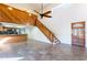 Open floor plan featuring a staircase, kitchen, and a front door with lots of light at 18914 5Th St, Lutz, FL 33548