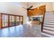 Spacious living room with lots of natural light and an adjacent kitchen at 18914 5Th St, Lutz, FL 33548