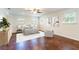 Cozy primary bedroom suite with a ceiling fan and natural light at 18914 5Th St, Lutz, FL 33548