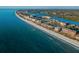 Breathtaking aerial view of a beautiful coastline with beach and waterways at 19111 Vista Bay Dr # 304, Indian Shores, FL 33785