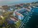 Breathtaking aerial view of the waterfront property with access to beach, tennis court, pool and docks at 19111 Vista Bay Dr # 304, Indian Shores, FL 33785