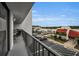 Balcony overlooking parking with views of nearby waterway and complex at 19111 Vista Bay Dr # 304, Indian Shores, FL 33785