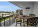 Inviting balcony featuring comfortable seating and scenic waterfront views of the surrounding community at 19111 Vista Bay Dr # 304, Indian Shores, FL 33785