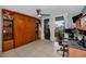 Functional bedroom with a built-in bookcase and Murphy bed, plus a desk and access to a private balcony at 19111 Vista Bay Dr # 304, Indian Shores, FL 33785