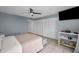 Comfortable bedroom includes a ceiling fan and offers generous storage with its large closets at 19111 Vista Bay Dr # 304, Indian Shores, FL 33785