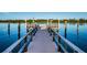 Picturesque dock on the tranquil waterfront, offering serene views and access to boating activities at 19111 Vista Bay Dr # 304, Indian Shores, FL 33785