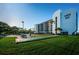 Well-maintained exterior of Vista Bay with lush green space and recreation areas at 19111 Vista Bay Dr # 304, Indian Shores, FL 33785