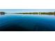 Panoramic waterfront view showcasing the serene beauty of the calm bay and the surrounding landscape at 19111 Vista Bay Dr # 304, Indian Shores, FL 33785