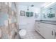 Cozy bathroom features a shower-tub combo, a modern vanity, and tile floors at 19531 Gulf Blvd # 205, Indian Shores, FL 33785