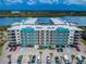 Modern waterfront condo with ample parking, landscaping and gulf access at 19531 Gulf Blvd # 205, Indian Shores, FL 33785
