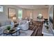 Inviting living room with stylish furniture, natural light, and hardwood flooring at 2024 Sidney St, Clearwater, FL 33763