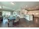 Open concept floor plan showing the dining area, kitchen, breakfast bar, and living room at 2024 Sidney St, Clearwater, FL 33763